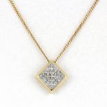 A 9ct yellow gold diamond set pendant and 9ct gold chain, L. 40cm.