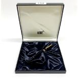 A boxed black Mont Blanc fountain pen with 14ct yellow and white gold nib.