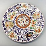 A Chinese hand enamelled porcelain charger, Dia. 46cm.