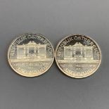 Two Austrian 1oz fine silver 1.5 euro Vienna Philharmonic coins.