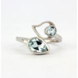 A 925 silver ring set with a pear and a round cut blue topaz, (N.5)
