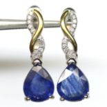 A pair of 925 silver gilt earrings set with pear cut sapphires, L. 2.4cm.