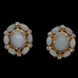 A pair of gold on 925 silver cluster earrings set with opals, L. 1.9cm.