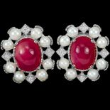 A pair of 925 silver cluster earrings set with cabochon cut rubies, pearls and white stones, L. 1.