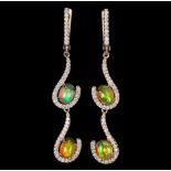 A pair of rose gold on 925 silver drop earrings set with cabochon cut opals and white stones, L.