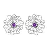 A pair of 925 silver flower shaped earrings set with amethysts, Dia. 1.8cm.