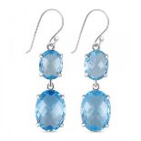 A pair of 925 silver drop earrings set with checked board cut blue topaz, L. 3.5cm.