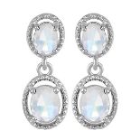 A pair of 925 silver drop earrings set with oval cut moonstones and white stones, L. 2.8cm.
