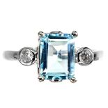 A 925 silver ring set with emerald cut blue topaz flanked by white stones, (N.5).