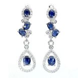 A pair of 925 silver drop earrings set with sapphires and white stones, L. 3.2cm.