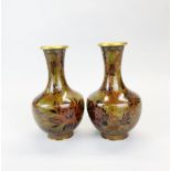 A pair of Chinese cloisonne vases, H. 24.5cm.