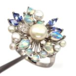 A 925 silver cluster ring set with tanzanits, opals and pearls, (P).
