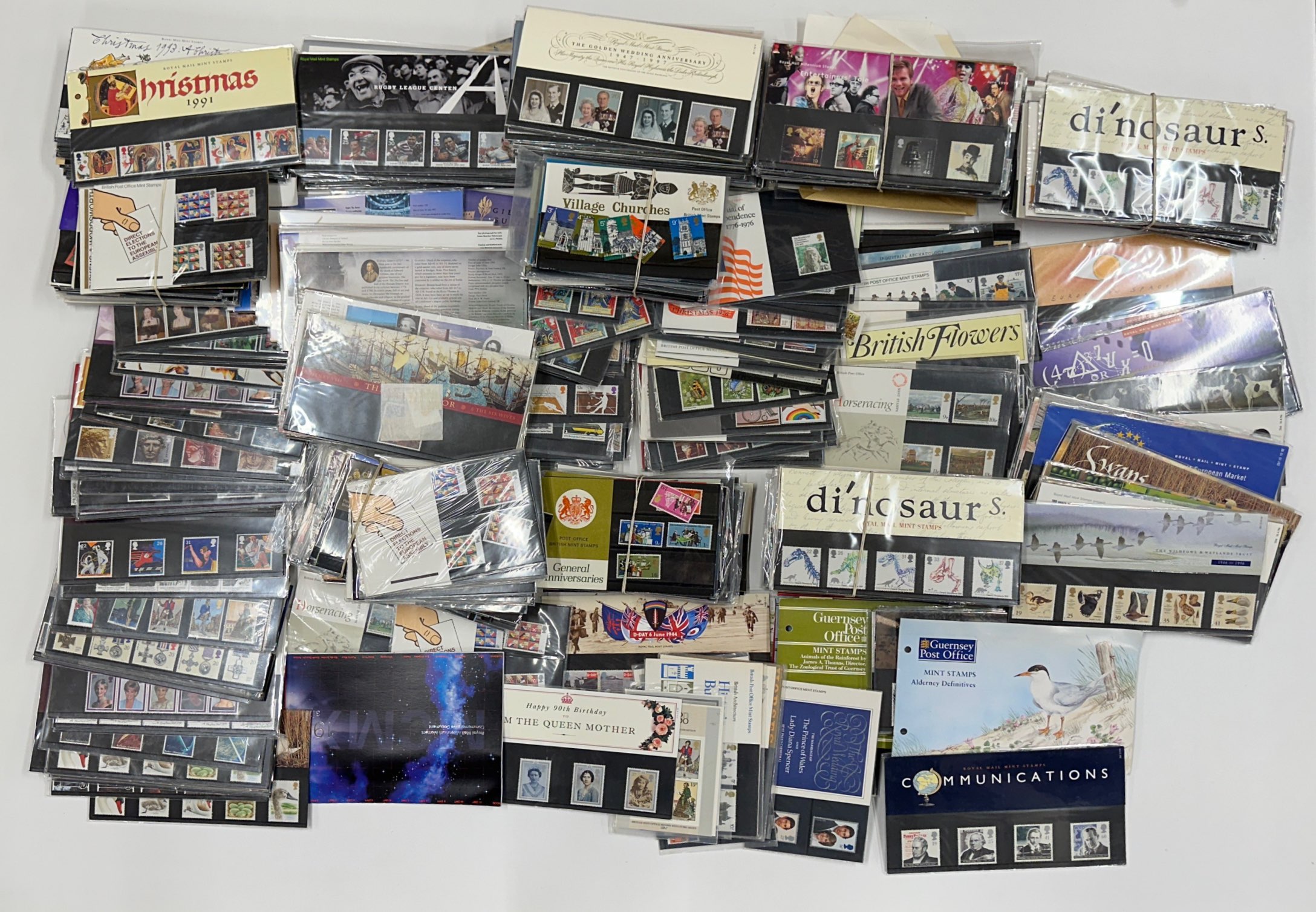 A collection of almost 400 Royal Mail presentation packs and mini sheets.