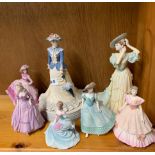 A group of seven Coalport porcelain lady figures.