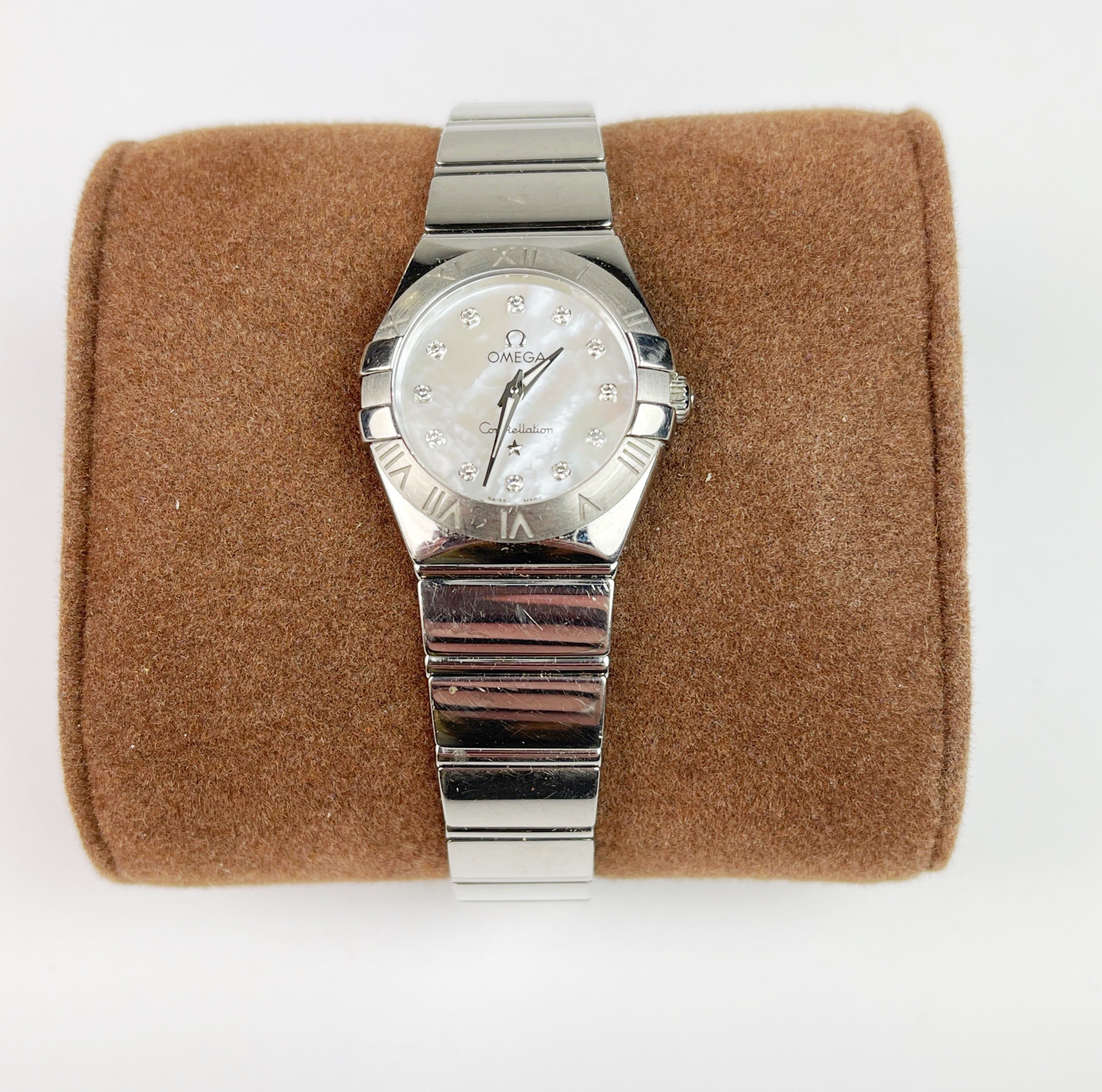 A ladies stainless steel Omega constellation wristwatch with mother of pearl and diamond dial, no