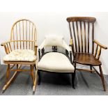 A country rocking chair, kitchen chair and small armchair.