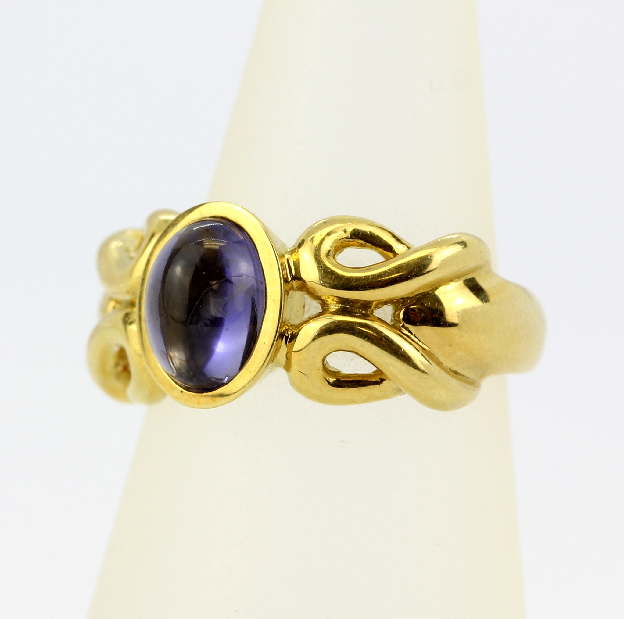 A 10ct yellow gold (stamped 10K) solitaire ring set with an oval cabochon sapphire, (L). - Image 3 of 3