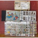 An album and a quantity of loose cigarette cards.