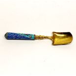 A Russian hallmarked enamelled silver gilt serving spoon, L. 16cm.