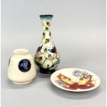 A 2000 Moorcroft porcelain tube lined bud vase signed by Rachel Bishop H. 17cm, with a 1993
