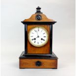 A Christian Lange mantel clock, H. 33cm. Understood to be in working order.