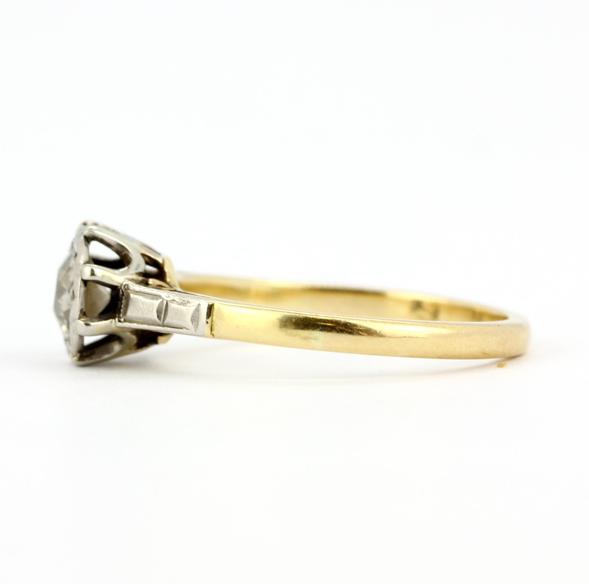 An 18ct gold and platinum solitaire ring set with a Victorian cut diamond, approx. 0.40ct, (M). - Image 2 of 2