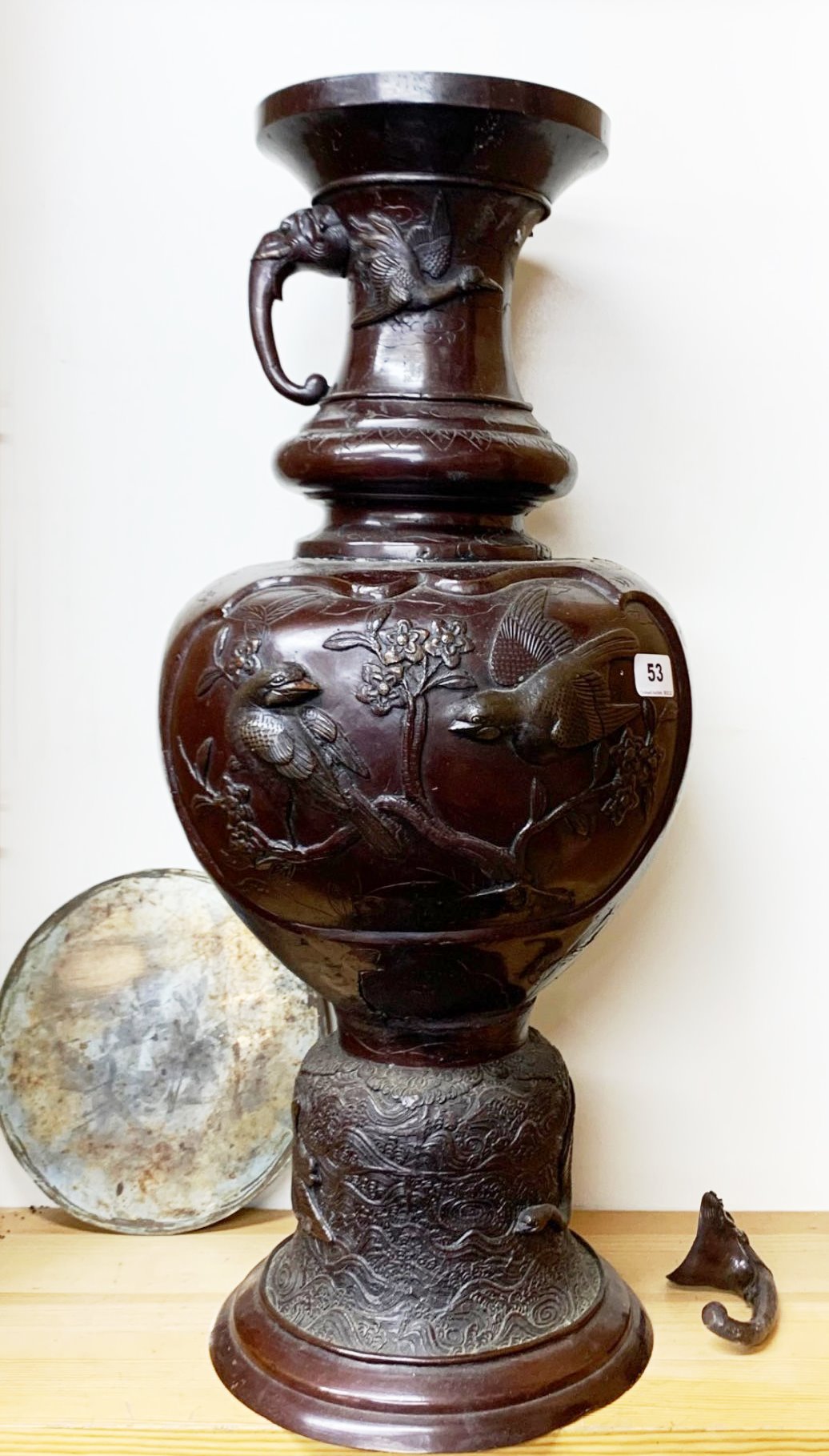 A large Japanese bronze vase with elephant head handles, H. 67cm. One handle currently detached