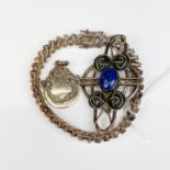 A silver stone set bracelet, Art Nouveau design brooch and fob.