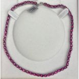 A 925 silver necklace set with oval cut pink topaz, approx. 58.91ct total, L. 45cm. With