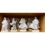 A group of nine Royal Worcester and Coalport figurines, tallest H. 21cm.