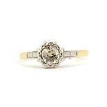 An 18ct gold and platinum solitaire ring set with a Victorian cut diamond, approx. 0.40ct, (M).