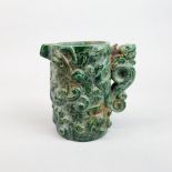 A Chinese carved jade/hardstone jug relief decorated with dragons, H. 16cm.