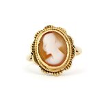 A hallmarked 9ct yellow gold cameo ring, (L). Slight bend to shank.