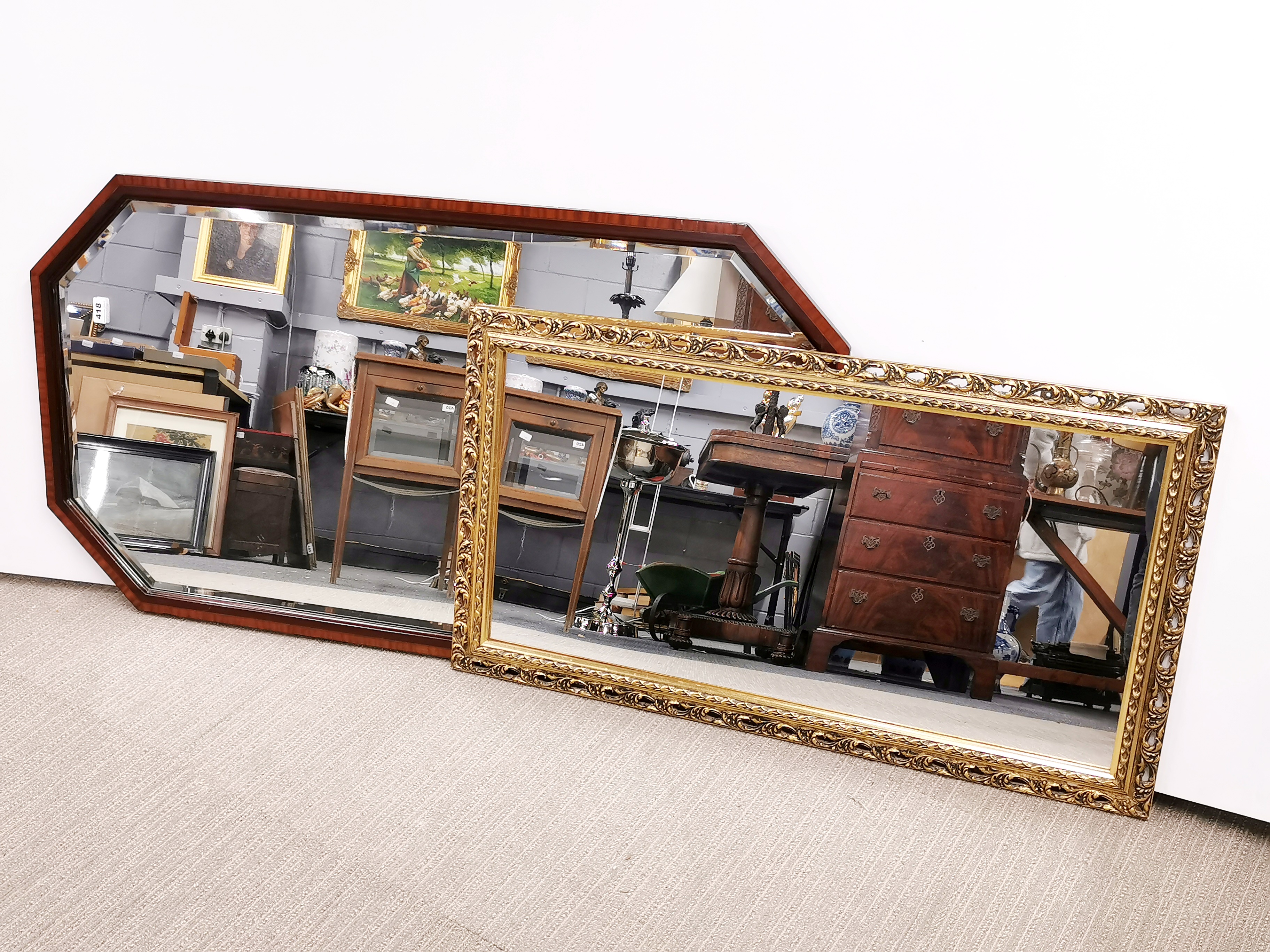 An octagonal inlaid mahogany over-mantle mirror together with a gilt framed rectangular mirror,