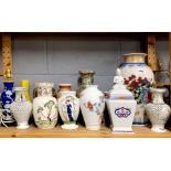 A group of porcelain and pottery vases, tallest H. 38cm.