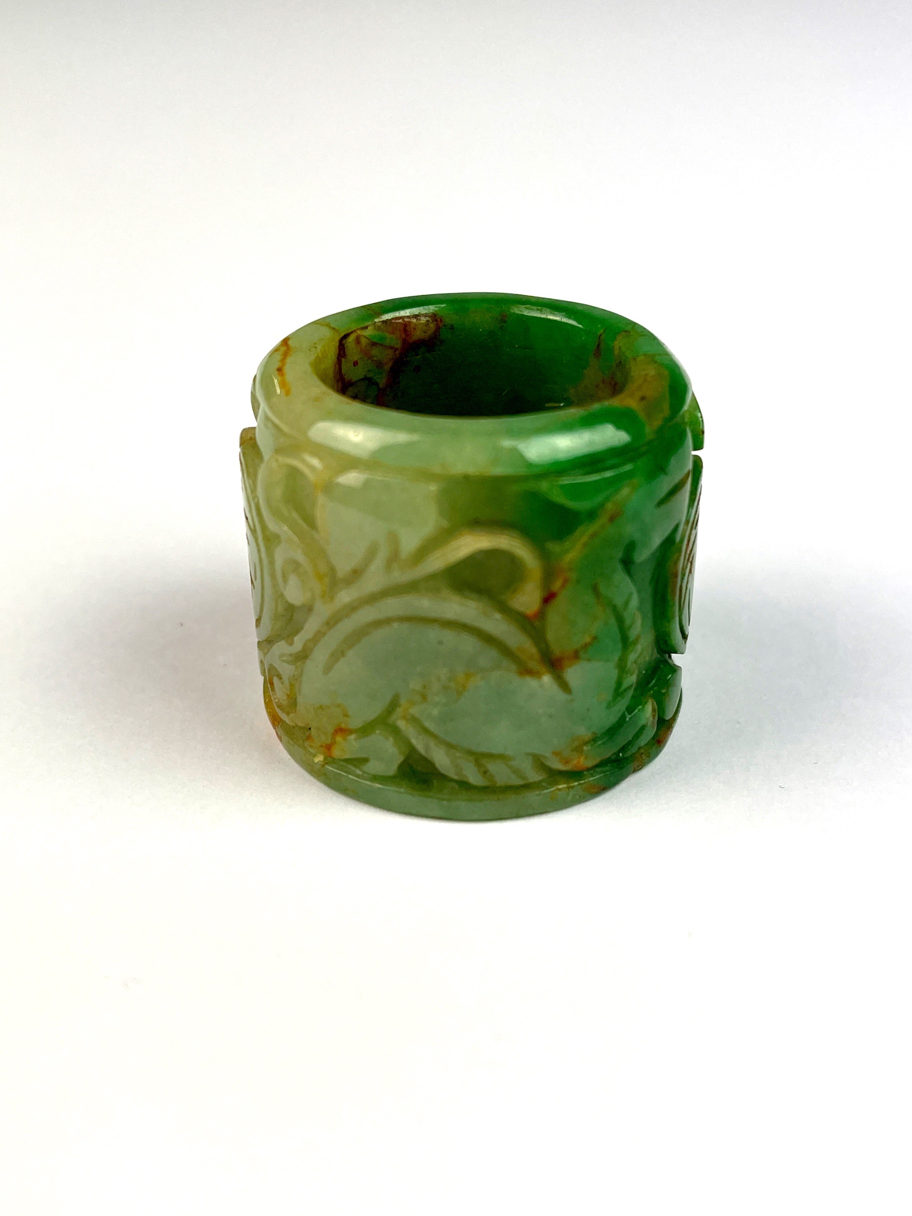 A Chinese carved green jade archer's thumb ring, W. 3cm. - Image 4 of 4