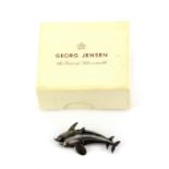 A Georg Jensen sterling silver dolphin brooch in original box, L. 4cm.