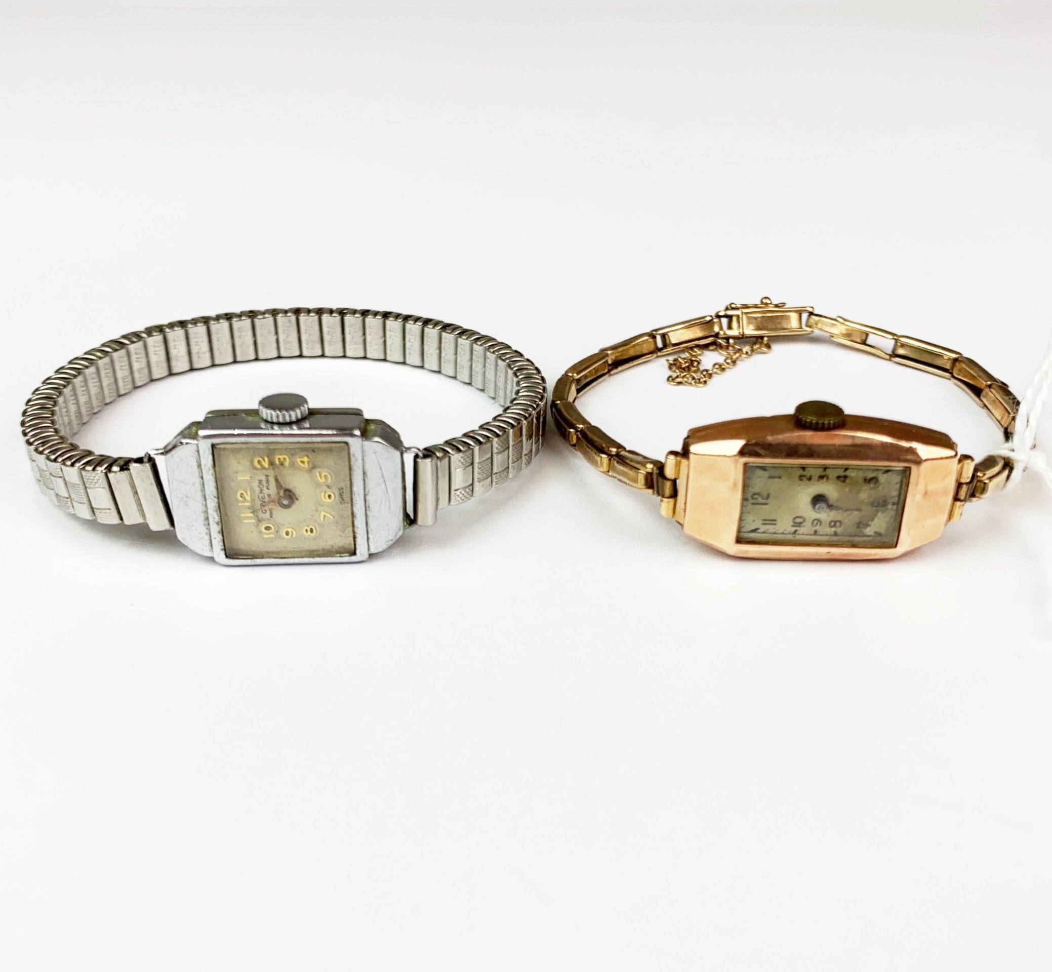 A lady's 9ct gold cased wristwatch with a rolled gold strap, together with a further lady's chromium