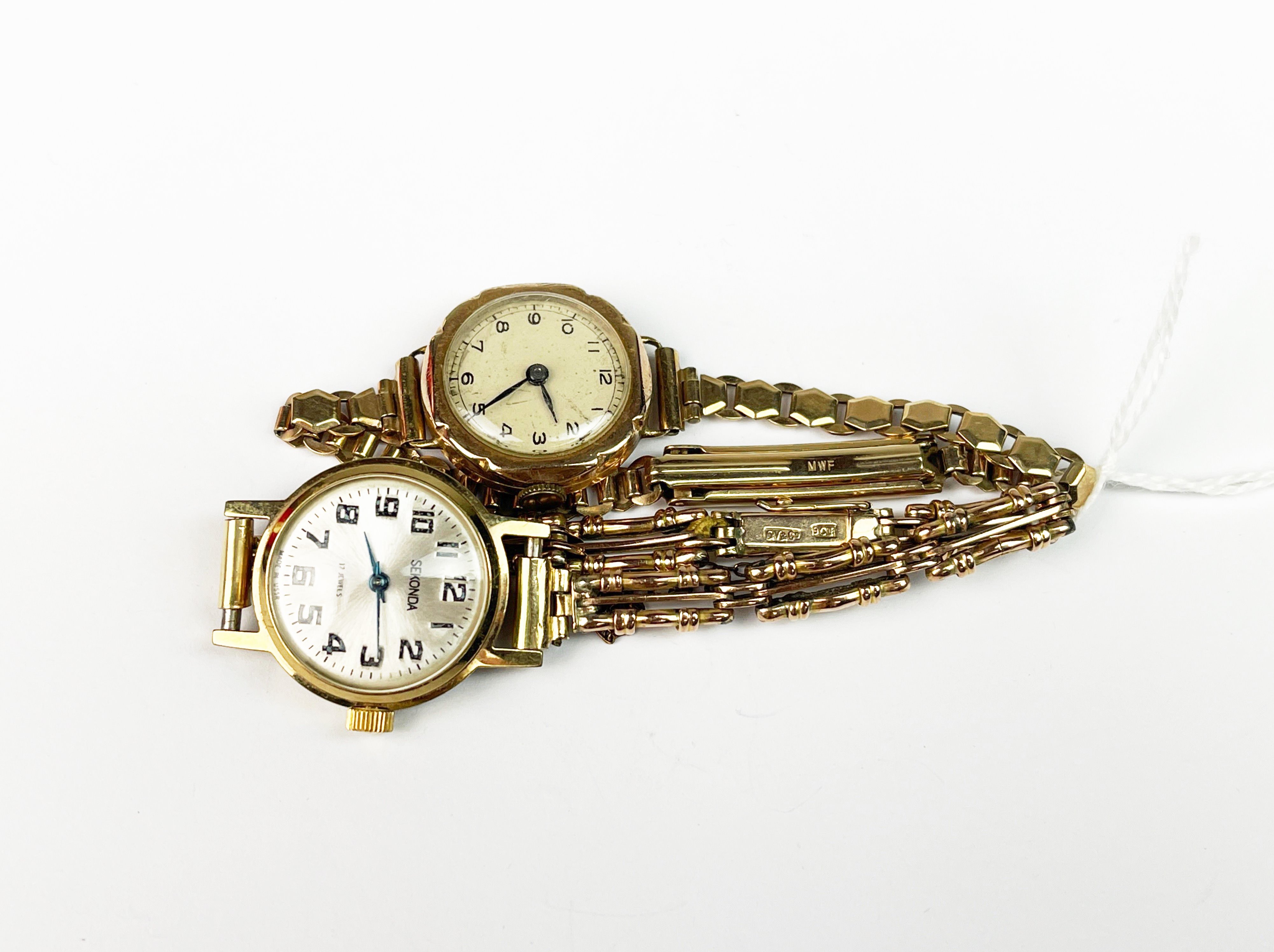 A ladies 9ct gold wristwatch on a rolled gold bracelet together with a gold plated wristwatch on a 9