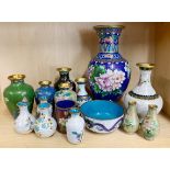 A group of Chinese cloisonne vases.