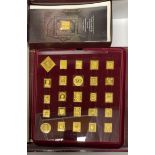 An album of gold on silver world stamp proofs (42 out of 73 pieces) with certificates.