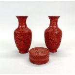 A pair of Chinese red cinnabar lacquer vases and a red lacquer box, vase H. 21cm box W. 9.5cm.