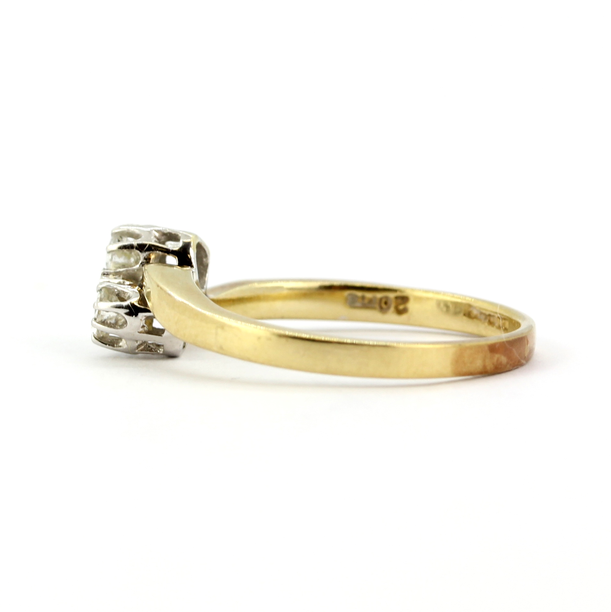 A hallmarked 9ct yellow gold crossover ring set with two brilliant cut diamonds, approx. 0.20ct - Image 2 of 2