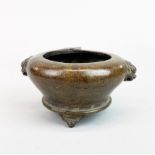 A Chinese bronze censer with lion head handles, W. 14cm, H. 7cm.