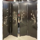A Chinese four panel lacquered screen, H. 182cm. A/F to one foot.