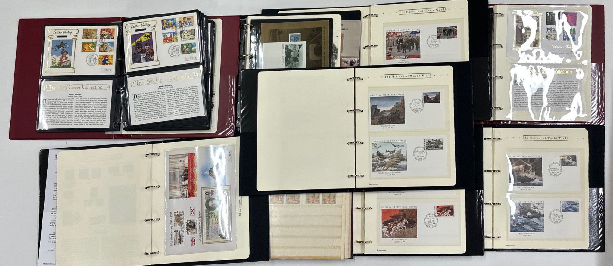 Eight albums of official first day cover stamps with a further album of mixed stamps.