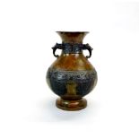 A Chinese pattinated bronze vase with archaic form decoration, H. 21cm.