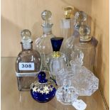 A group of perfume and dressing table bottles, tallest H. 19cm.