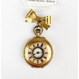A very pretty lady's 14ct gold outer cased half hunter watch on a 9ct gold bow pin, watch dia. 3cm.