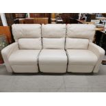 A three seater cream leather electric adjustable settee, W. 200cm. (No controls)